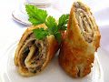 Crepes with mushroom, onion and yellow cheese